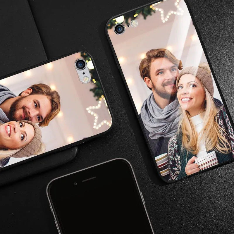 Patterned ultra-thin iPhone case with raised camera bumper edge on a table.