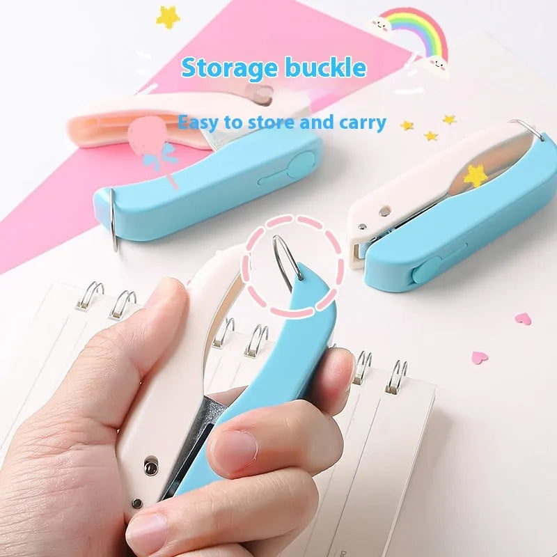 Manual handheld punching machine with love, star, and round pattern plates for paper craft.