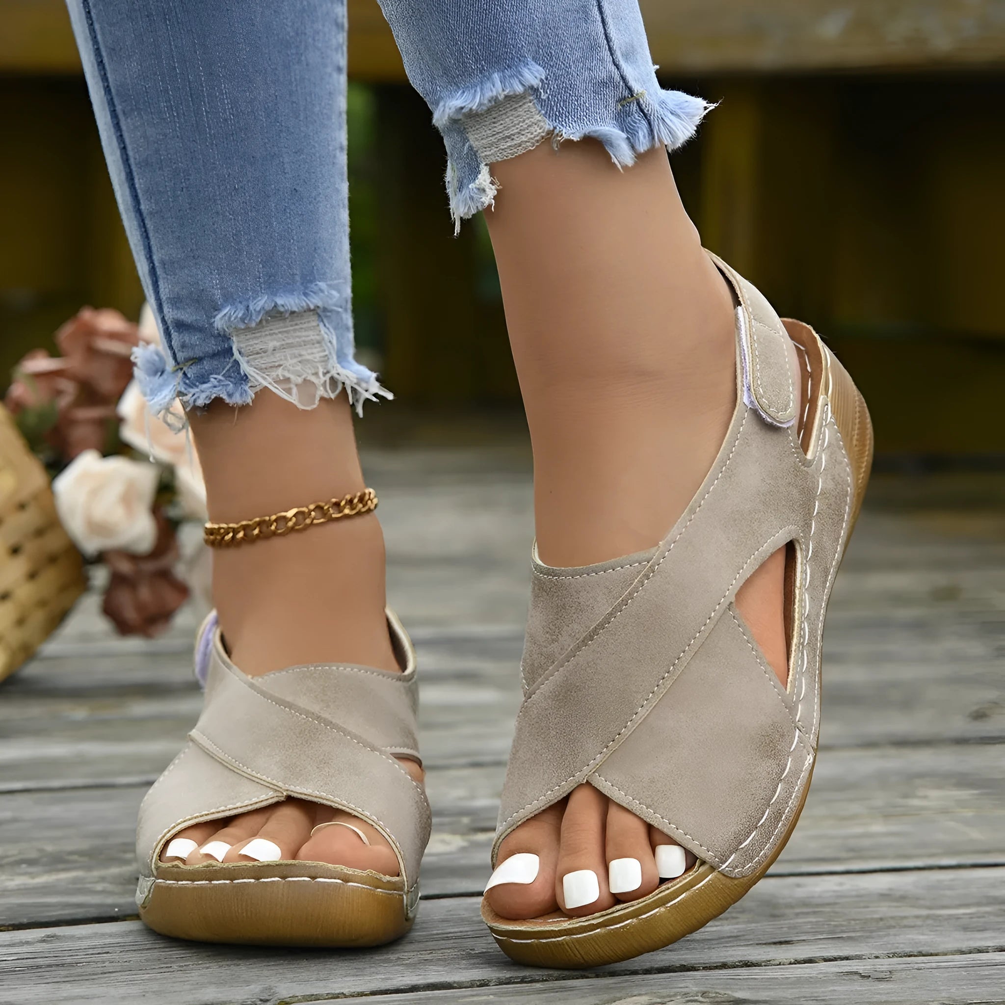 Women's Roman platform sandals with skirt detail, open toe, and adjustable velcro strap.