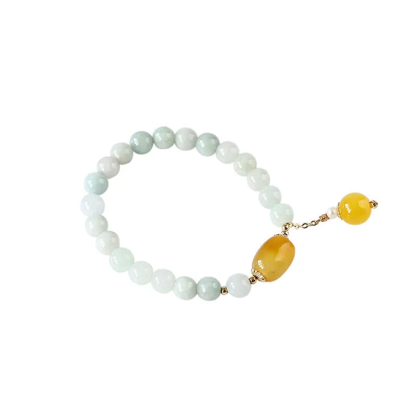 Women's ethnic geometric bracelet with hanging red agate beads and 14K gilded finish