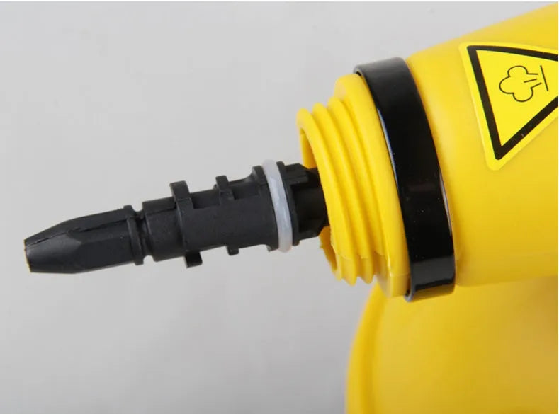 Yellow handheld steam cleaner with 450ml liner on a kitchen surface, 26x21cm size