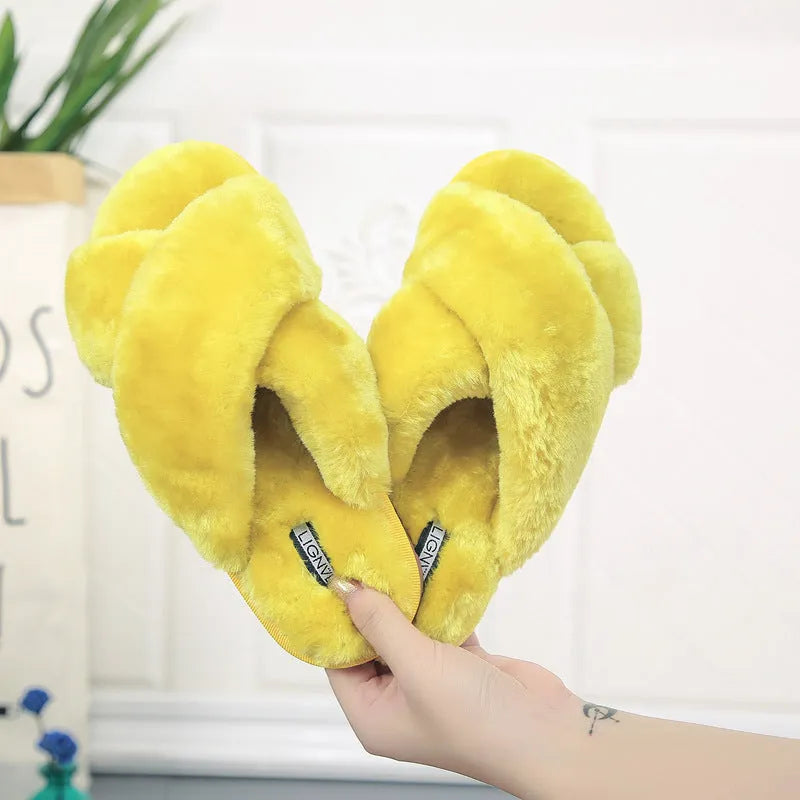 Cross open-toe fur slippers in black with a patterned non-slip rubber sole.