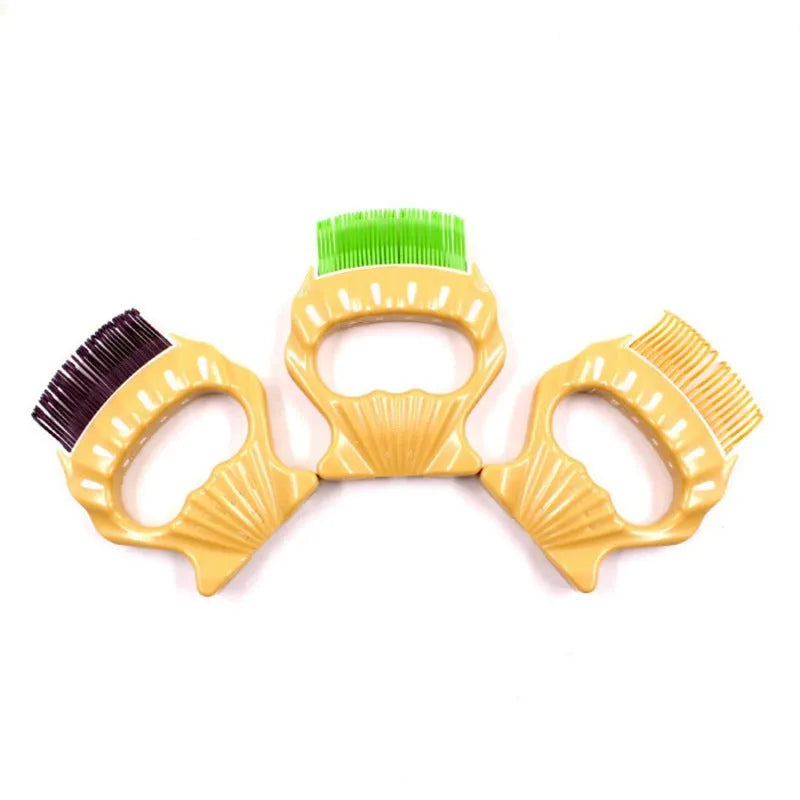 Green shell-shaped pet grooming comb with bent wire bristles and an anti-slip plastic handle.