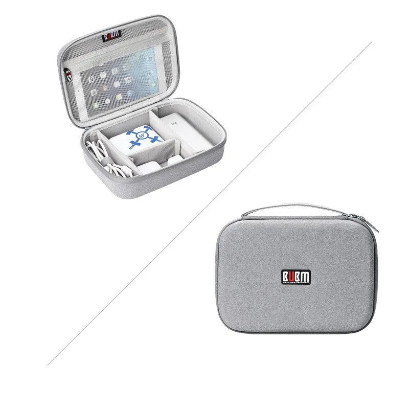 Black EVA digital storage bag for organising headphones and cables on a desk