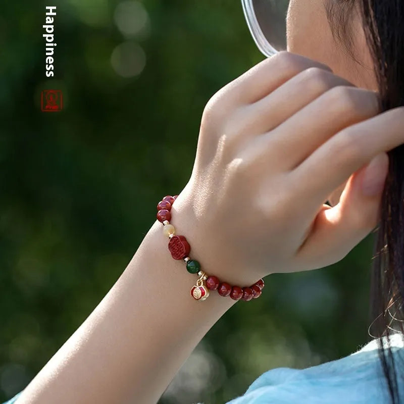 Fu character cinnabar and emperor sandstone beaded bracelet in new Chinese style.