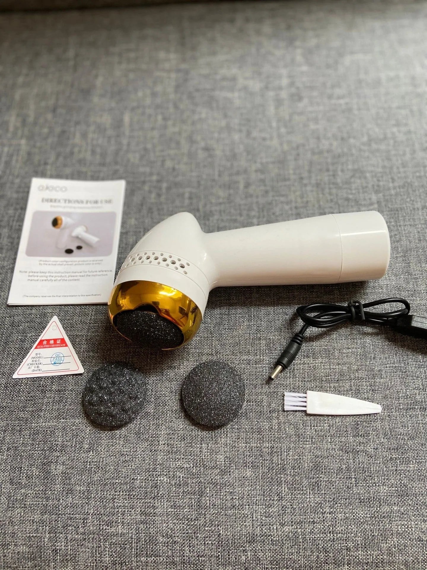 Electric vacuum foot grinder with quartz grinding head in gold, pink, or white colour options