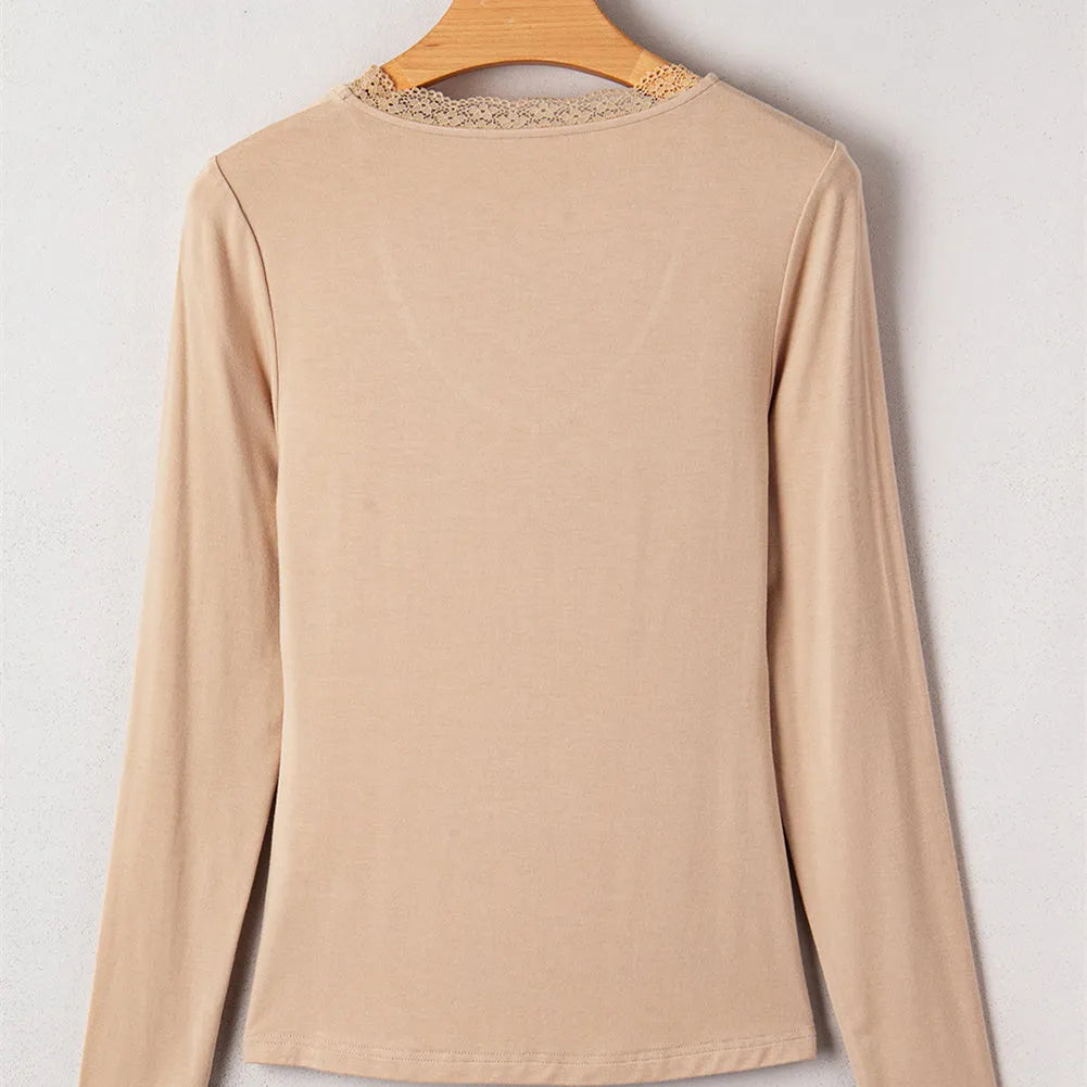Women's solid colour long sleeve casual top with lace trim, shown in red and skin tone.