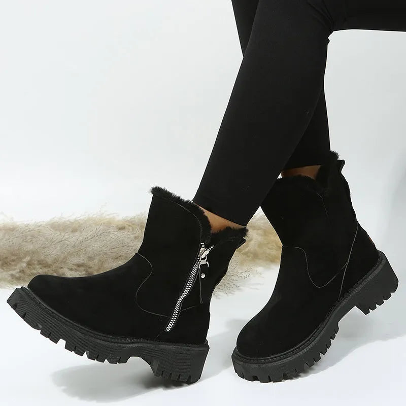 Women's black thick plush high-top snow boots with a side zipper and rubber sole