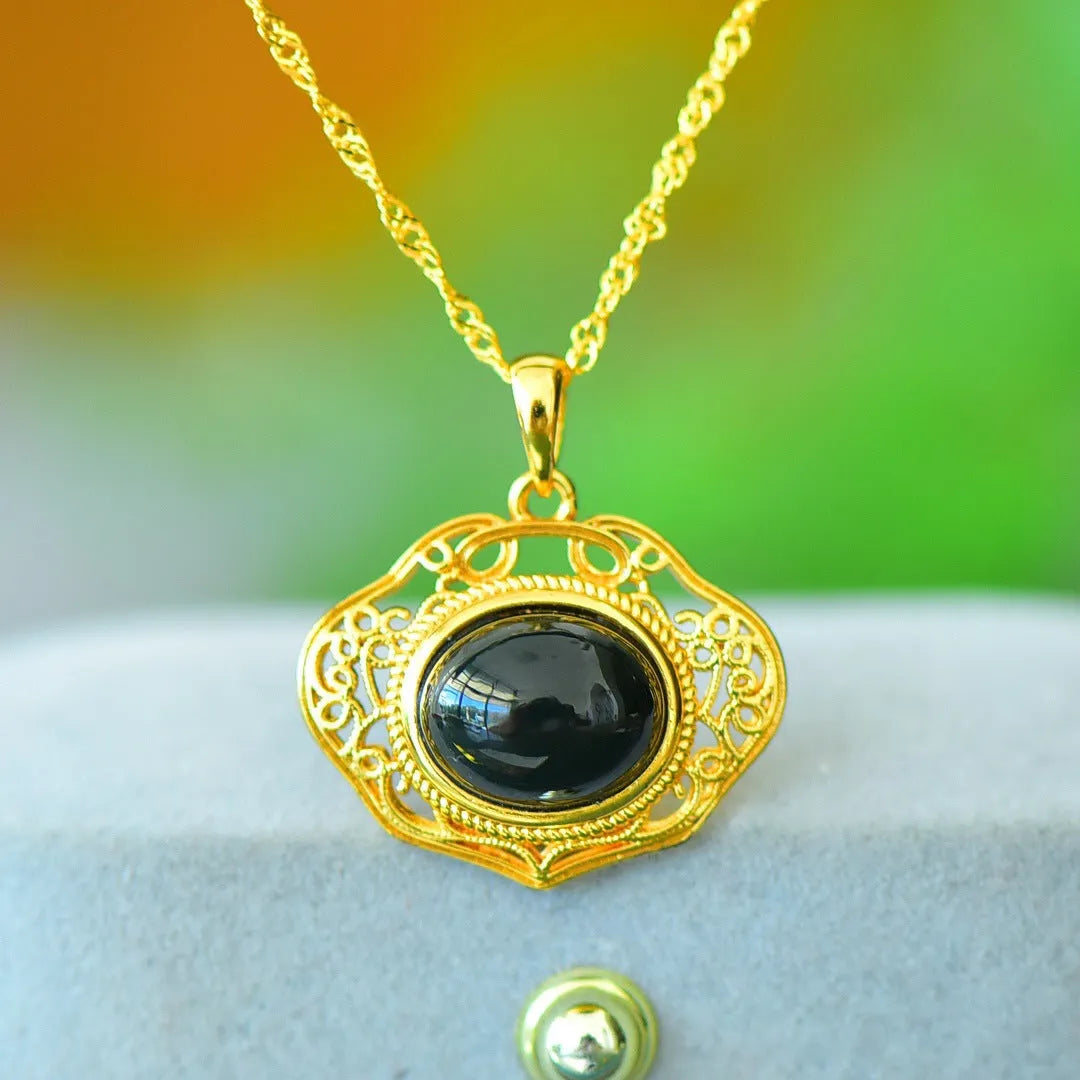 Flat polished Hetian Grey Jade pendant with copper inlay and Ink Blue Jade accents on a necklace.