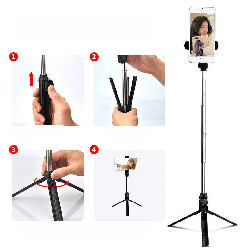 Compact black aluminium Bluetooth selfie stick with integrated tripod legs and a 360-degree rotating phone clip.