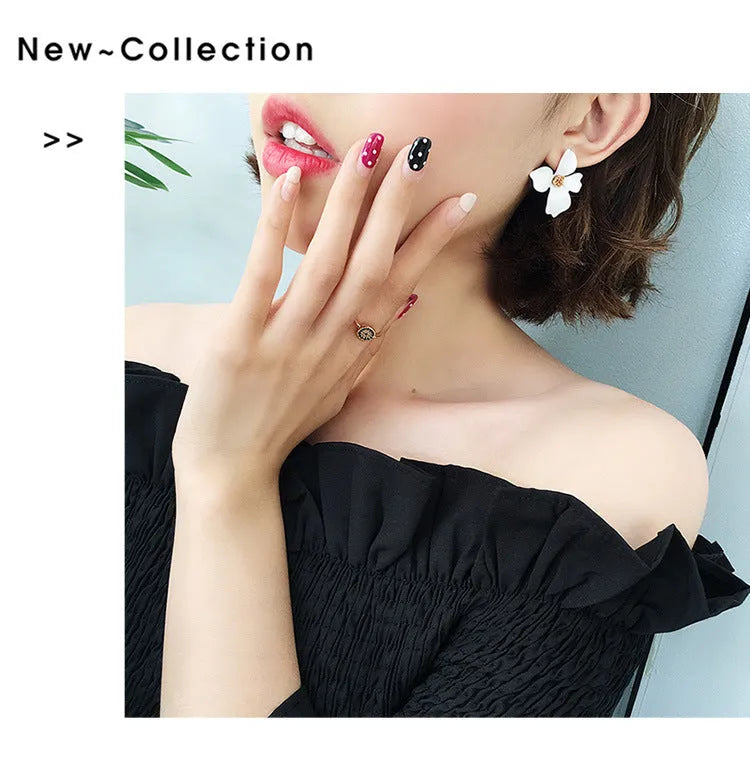 Alloy flower stud earrings with electroplated finish in white and pink colour options