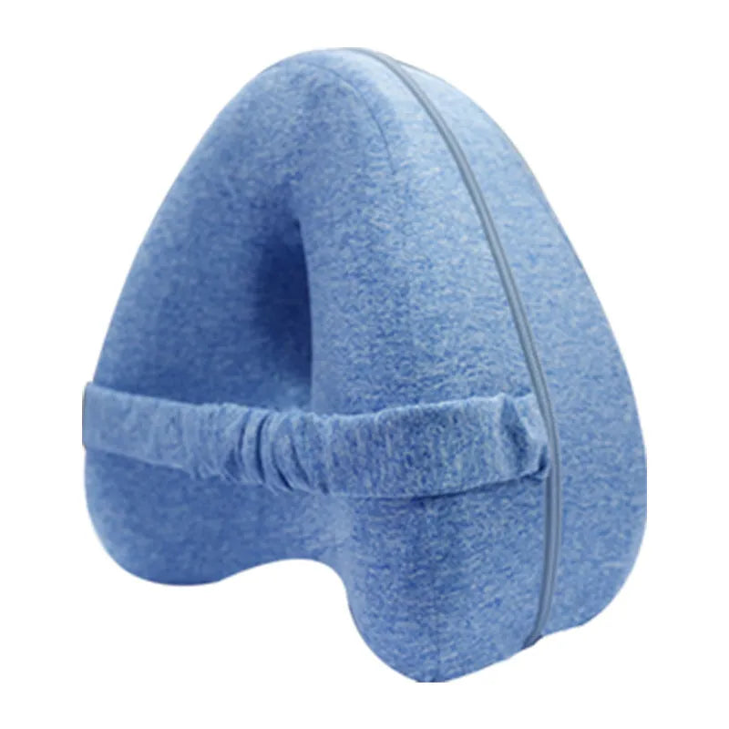 Heart-shaped dark blue memory foam leg pillow for adult use.