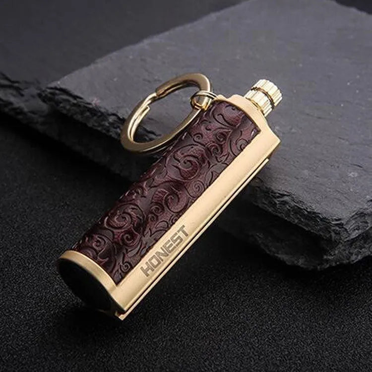 Metal keychain lighter with flint striker and bottle opener in black nickel finish