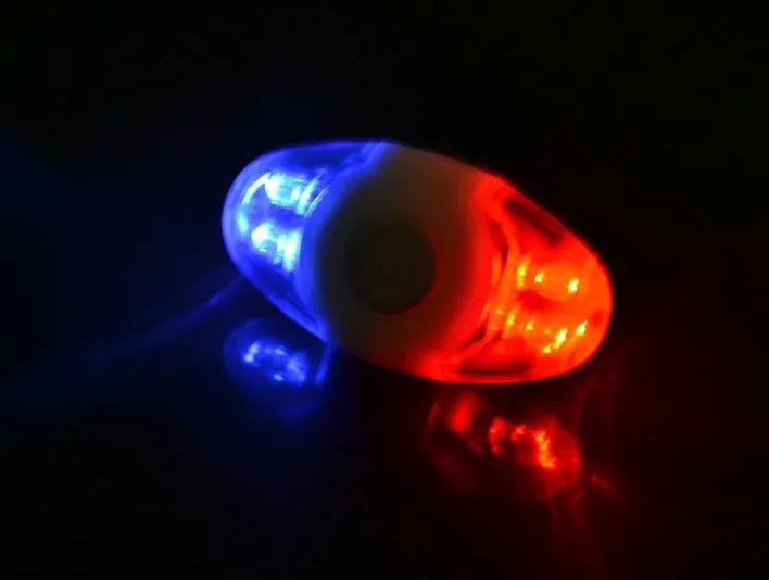 Red and blue LED equipment tail light with adjustable base showing horizontal and vertical placement options
