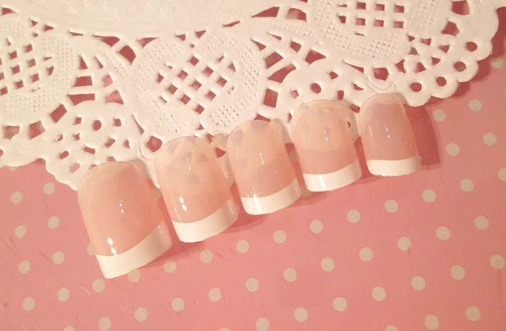 Set of finished French long fake nail patches in light pink, rose red, and white
