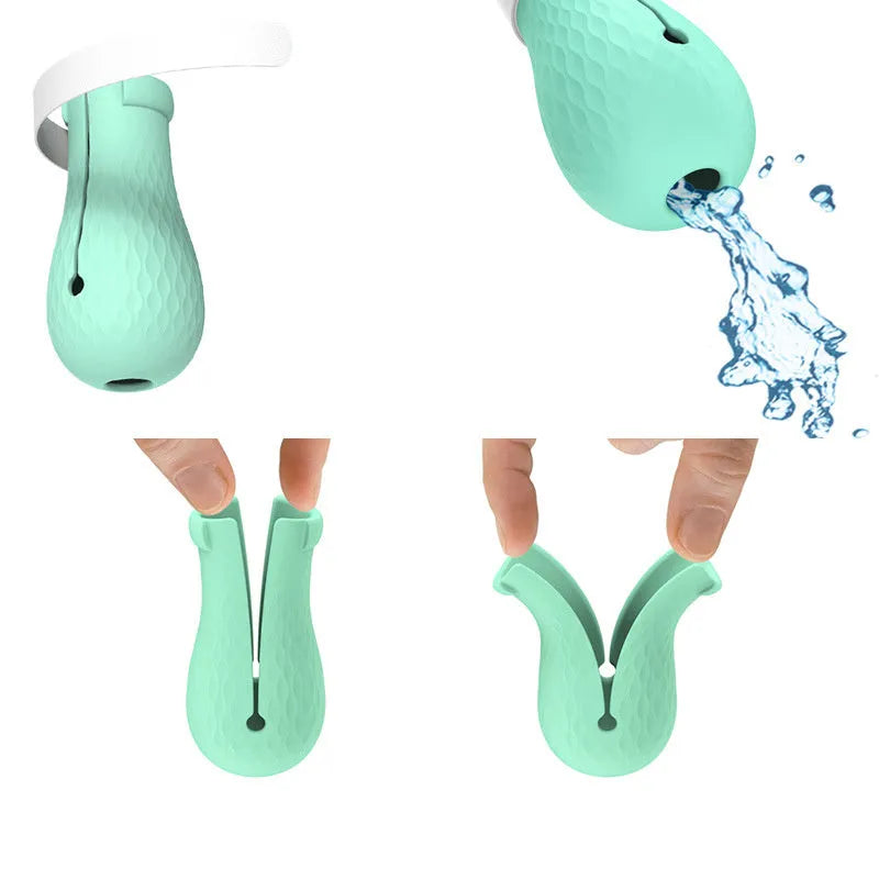 Set of four green silicone cat anti-scratch foot covers or gloves for pet care.