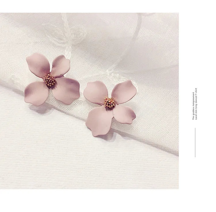 Alloy flower stud earrings with electroplated finish in white and pink colour options