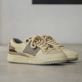 Beige low-top skateboard shoes with microfiber upper and round-toe design