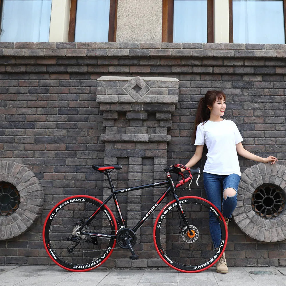 Aluminium alloy road bike with 21-speed gearing, double disc brakes, and bend handlebar in titanium silver or white red.