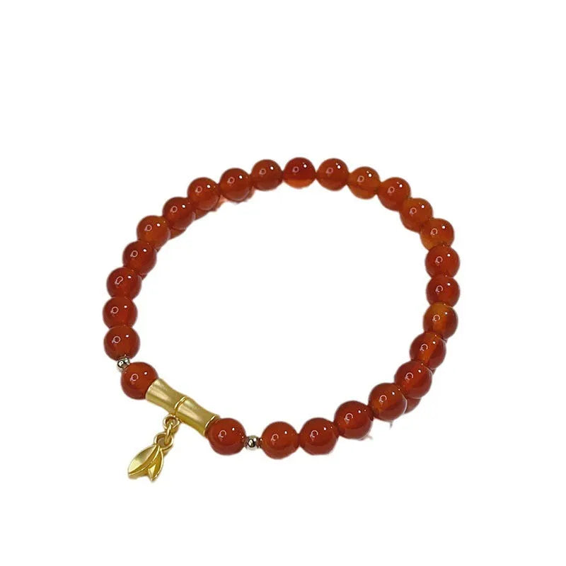 Chinese style red agate bracelet for women with dragon design, manual craftsmanship.
