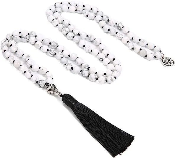 Handmade knotted stone bead necklace with 108 beads, showing geometric design and natural stone colours.