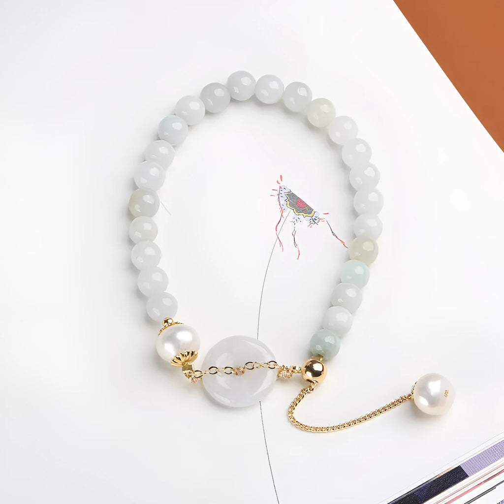 Natural emerald green jade bracelet with pearl accents and peace symbol buckle clasp