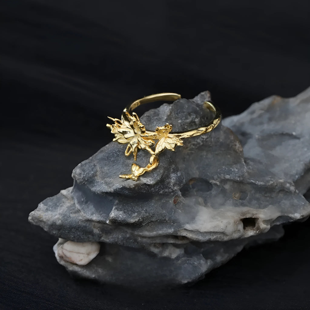Adjustable silver butterfly ring with electroplated finish in white gold or 18K gold colour option
