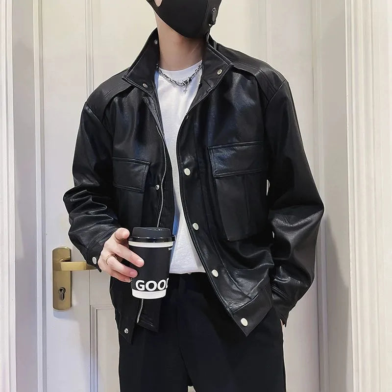 Men's black Korean-style PU leather pilot jacket with side pockets on a hanger.