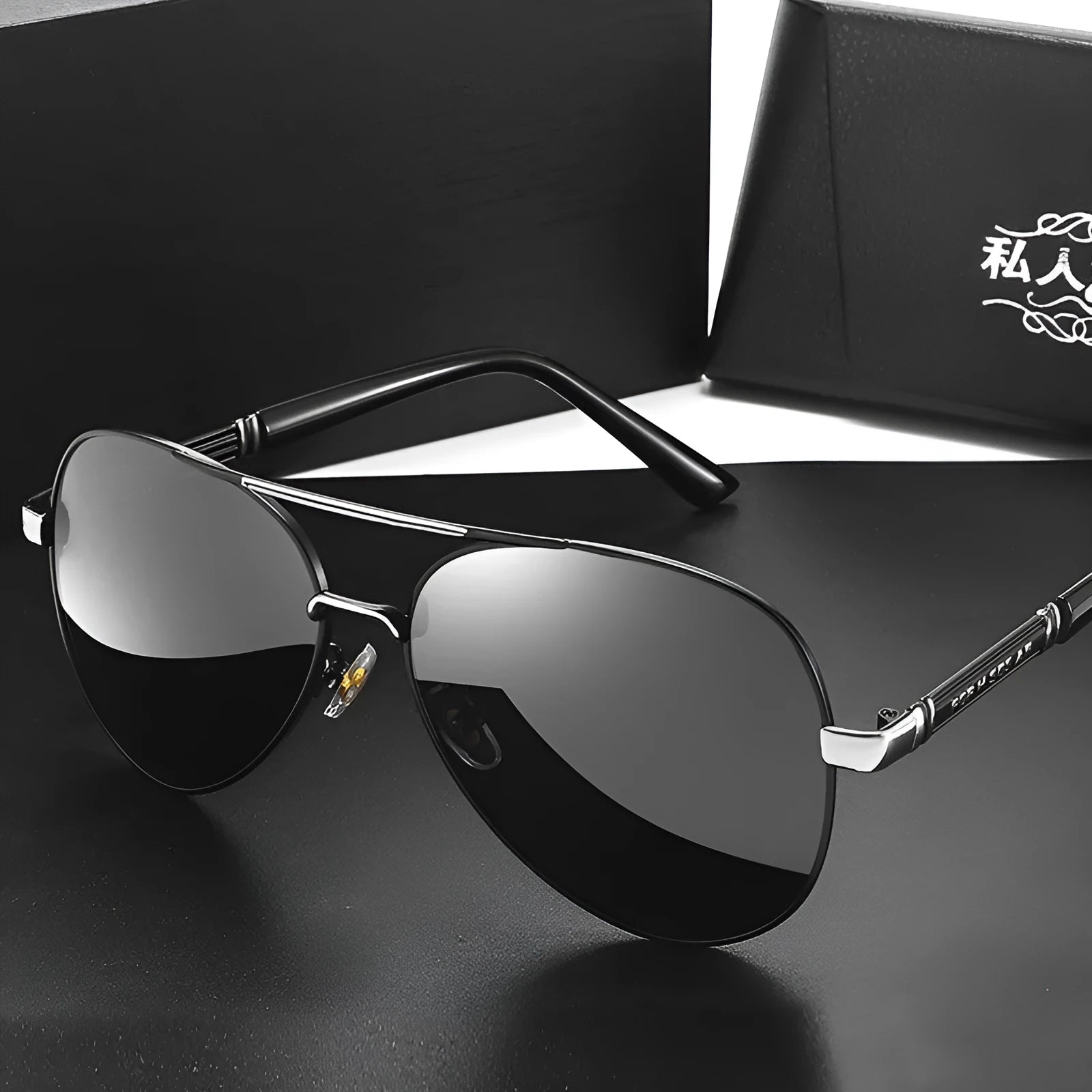 Gold metal frame polarised sunglasses with grey lenses on a table, showing dragon and phoenix temple detail.