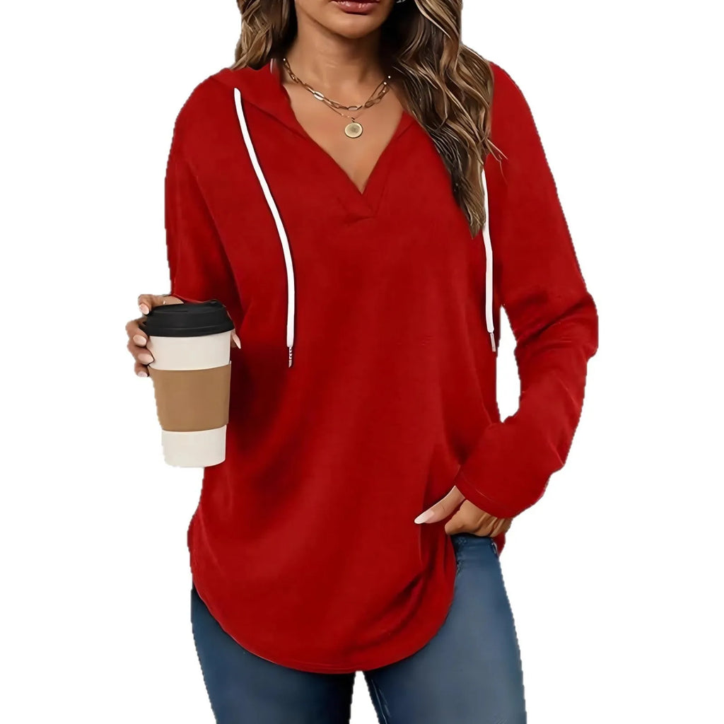 Red women's V-neck hooded sweatshirt with loose fit on a hanger, showing medium length.