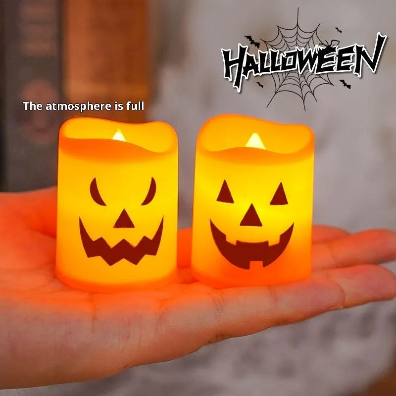 Set of six plastic pumpkin-coloured Halloween electric candle lamps in European style on a dark background