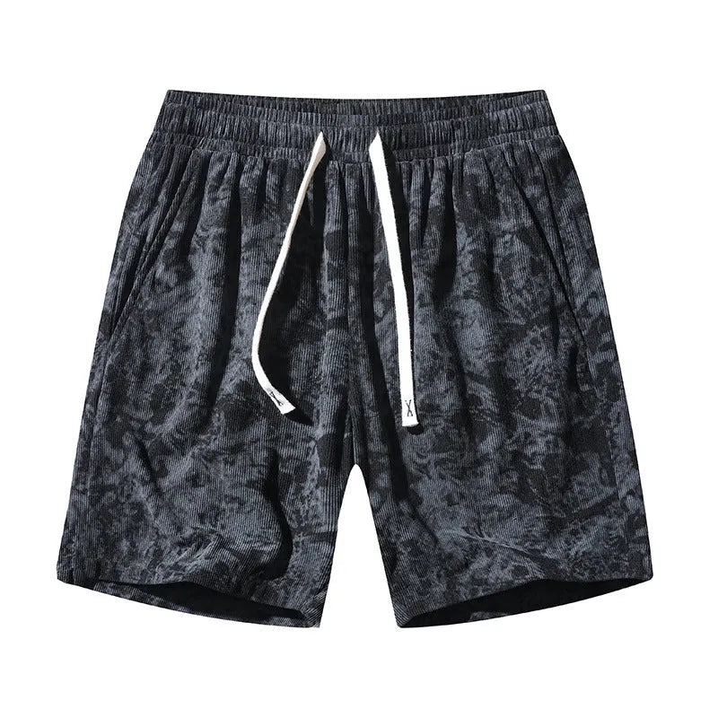 Men's camouflage pattern corduroy athletic shorts with a high waist on a neutral background.