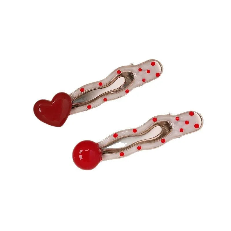 Red stereo love heart-shaped hairpin with French retro dots and willow leaf design