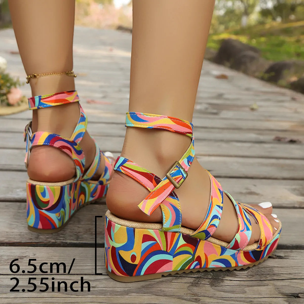 Women's wedge sandals with buckle strap showing fish mouth toe design in single colour