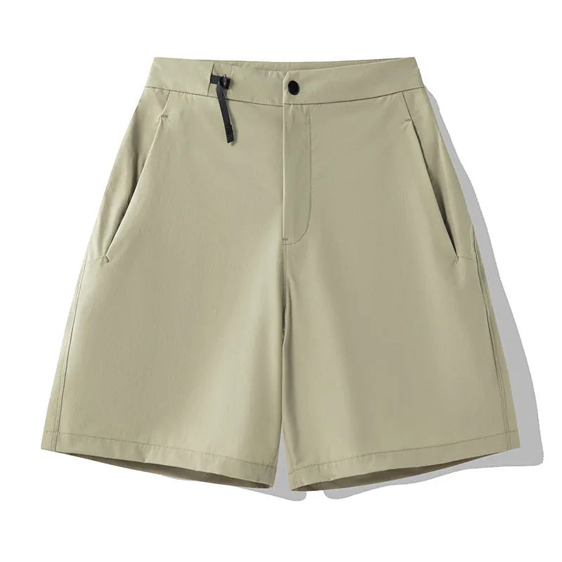 Men's khaki quick-dry sports shorts with 3D cut and four-way stretch fabric for athletic movement.