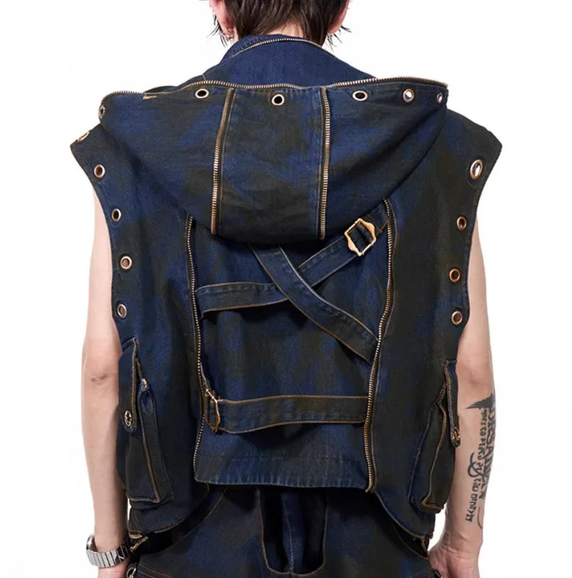 Blue denim-style hooded vest coat with matching trousers laid flat as a two-piece set.
