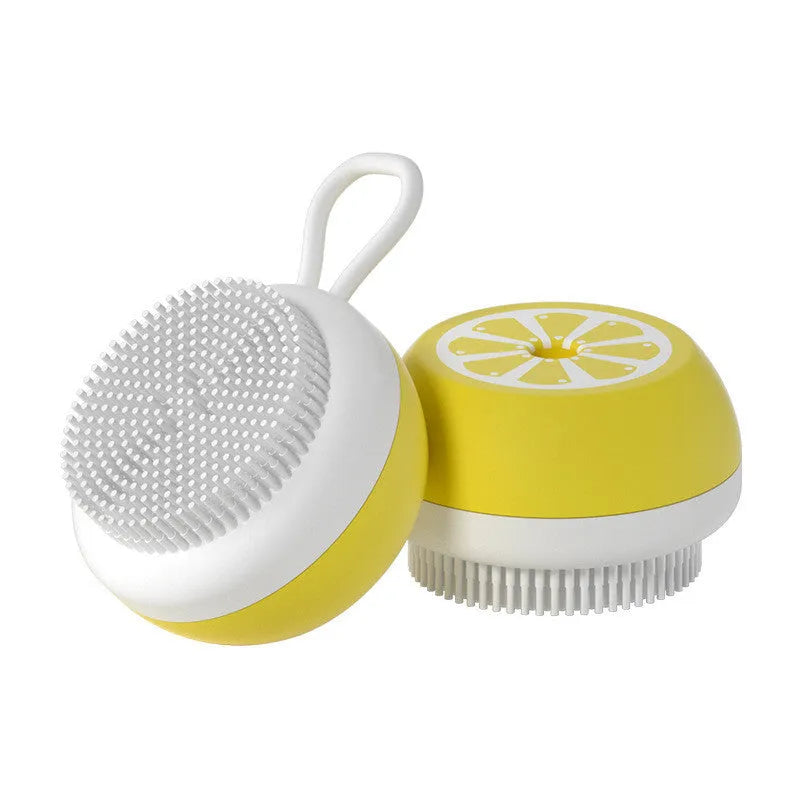 Yellow silicone pet bath brush with comb teeth and massage nodes on a 2-in-1 head.