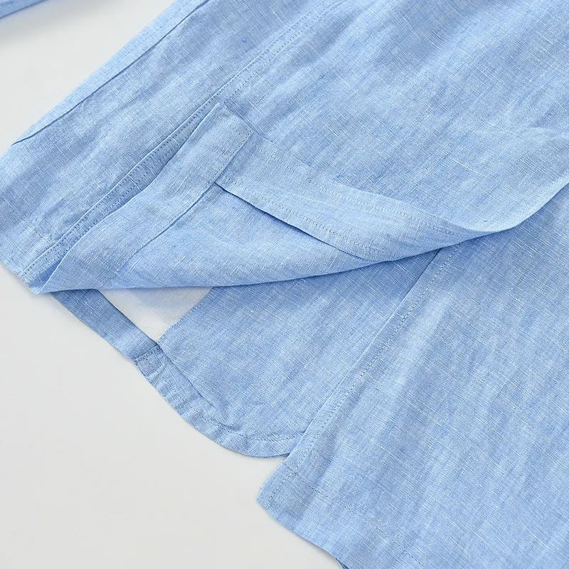 Men's thin solid colour linen coat with stick pockets on a hanger.