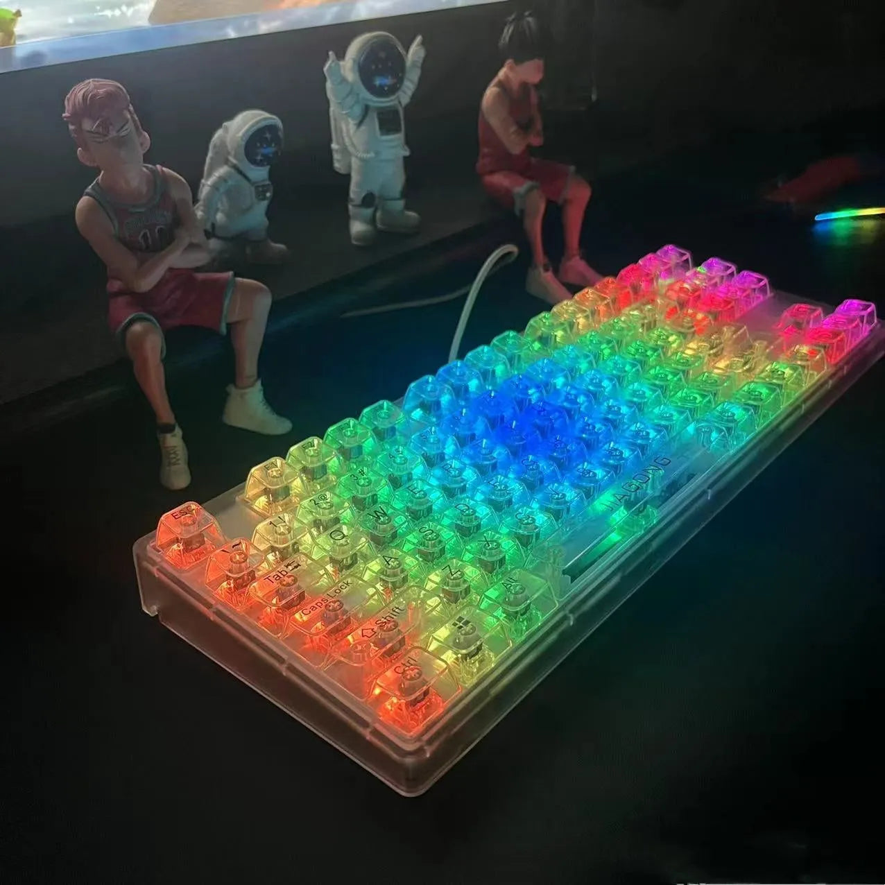 Universal transparent plastic 132-key keyboard key cap set laid out on a table.