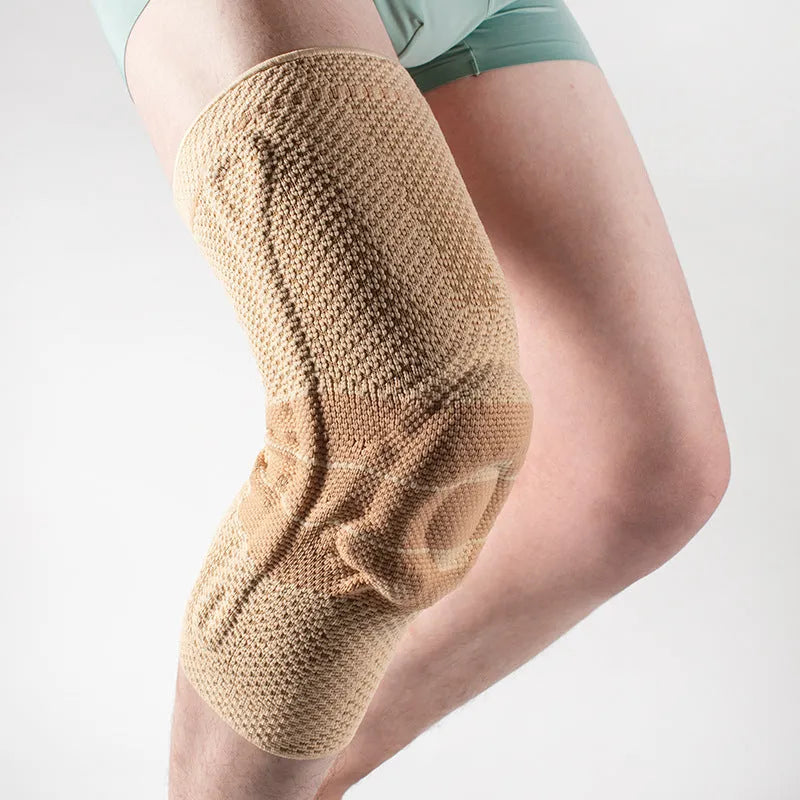 Adult sports knee pads in black and blue, made from nylon and spandex fabric.