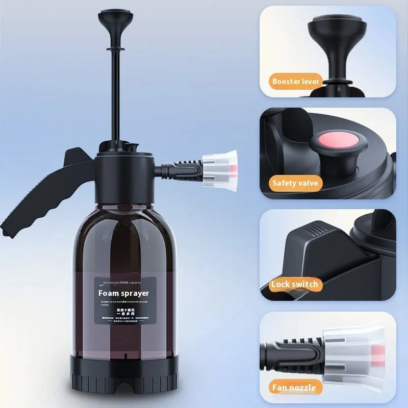 Black hand-held pressure sprayer with 2-litre capacity and two nozzles for garden and car cleaning