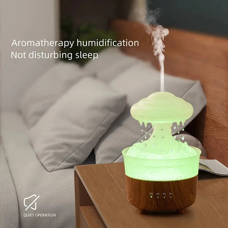 Wood grain rain cloud shaped humidifier and essential oil diffuser with night light on a table.