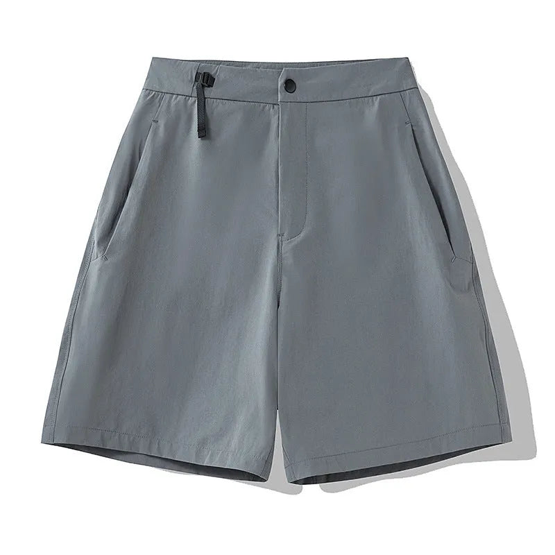 Men's khaki quick-dry sports shorts with 3D cut and four-way stretch fabric for athletic movement.