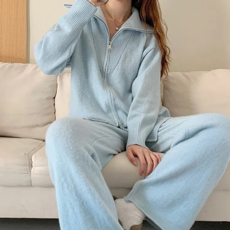 Women's knitted polyester two-piece set with zipper cardigan and wide-leg trousers in a solid colour.