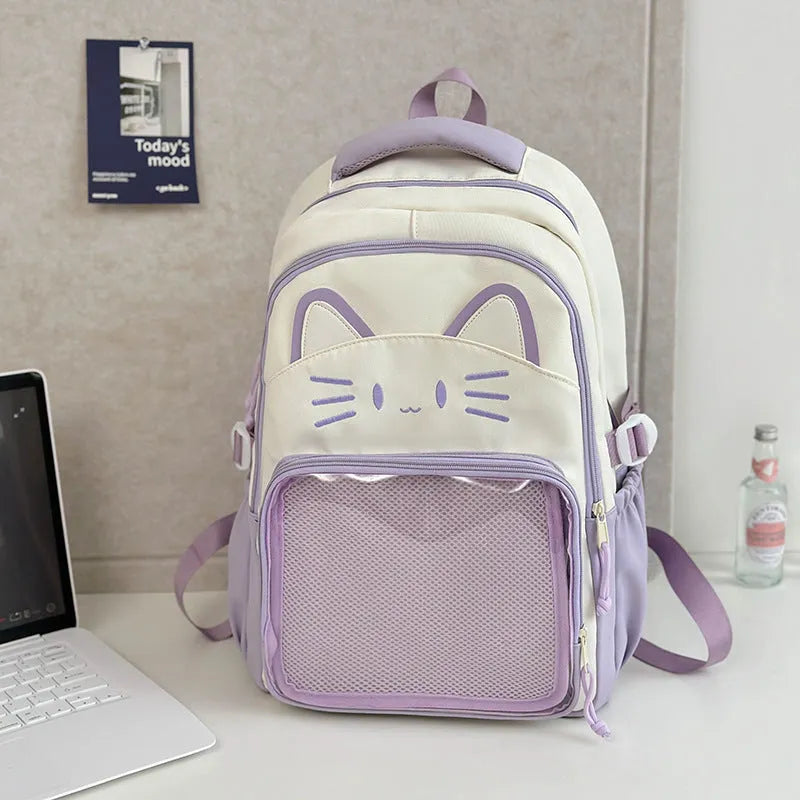 Korean cartoon backpack in multiple colours with curved shoulder straps and badge pendant options