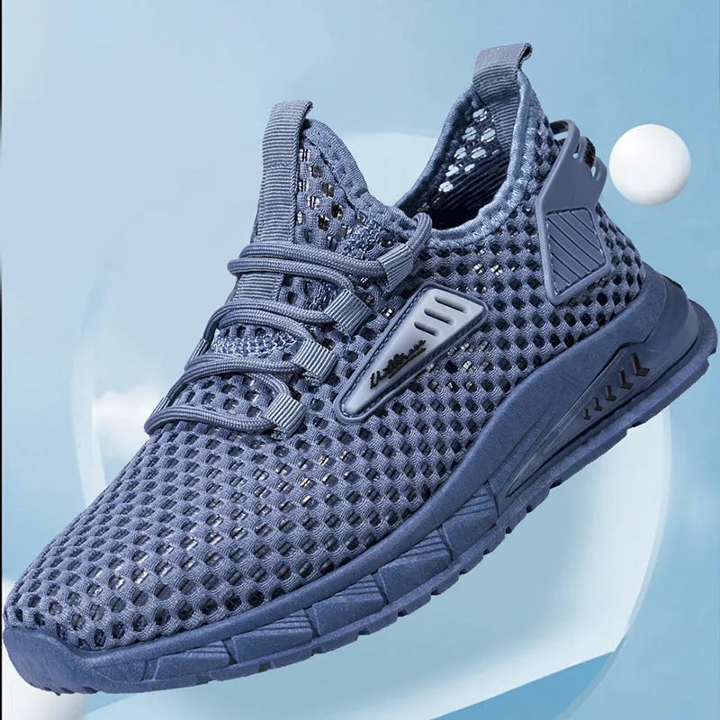 Men's beige casual sneakers with mesh lining and lace-up front on a grey background