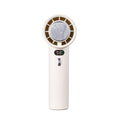 White portable handheld turbo fan with cooling function and display, shown on a table.