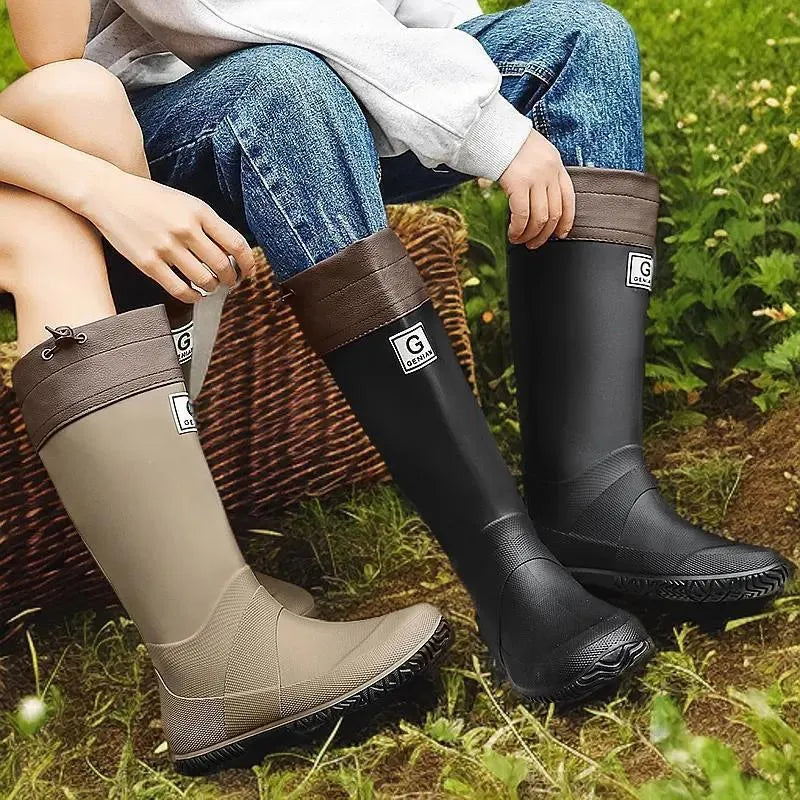Unisex rain boots in black brown gray green with plastic upper, flat heel, round toe and leather stitching
