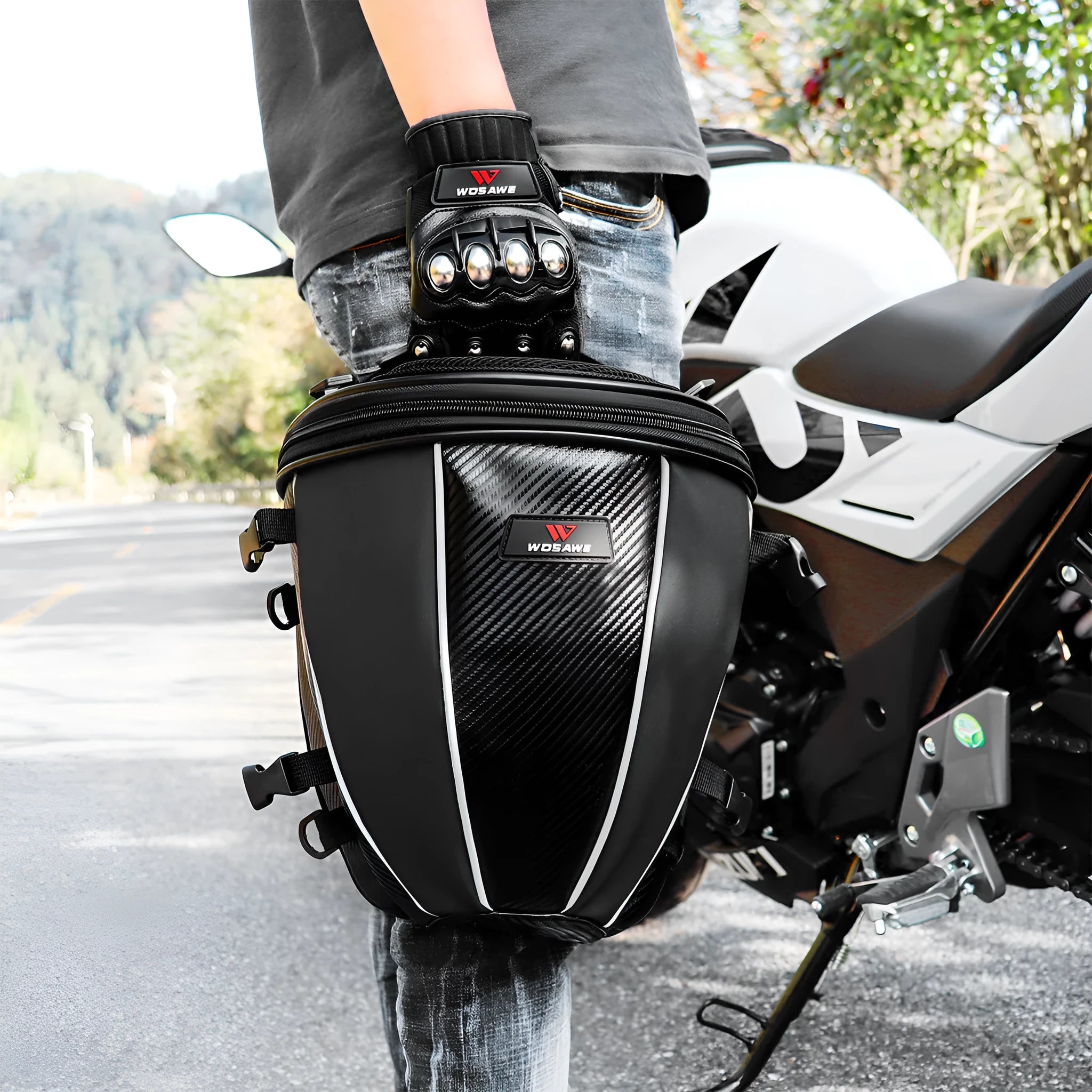 Black motorcycle seat bag with reflective lines and adjustable hooks for fuel tank or rear seat mounting