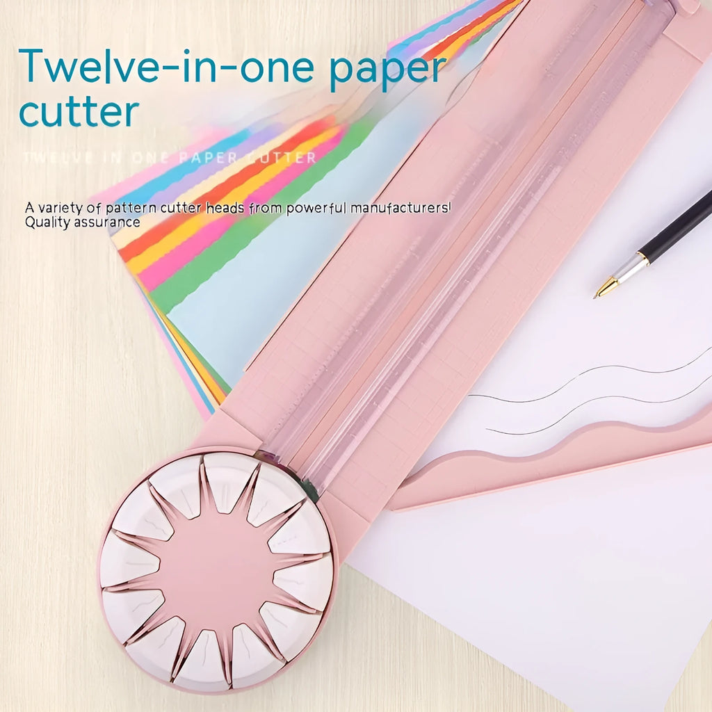 Pink and black 12-in-1 dotted line plastic rotary paper cutting machine on a craft table.